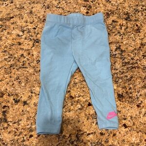 Nike Kids Light Blue Leggings with Pink Logo